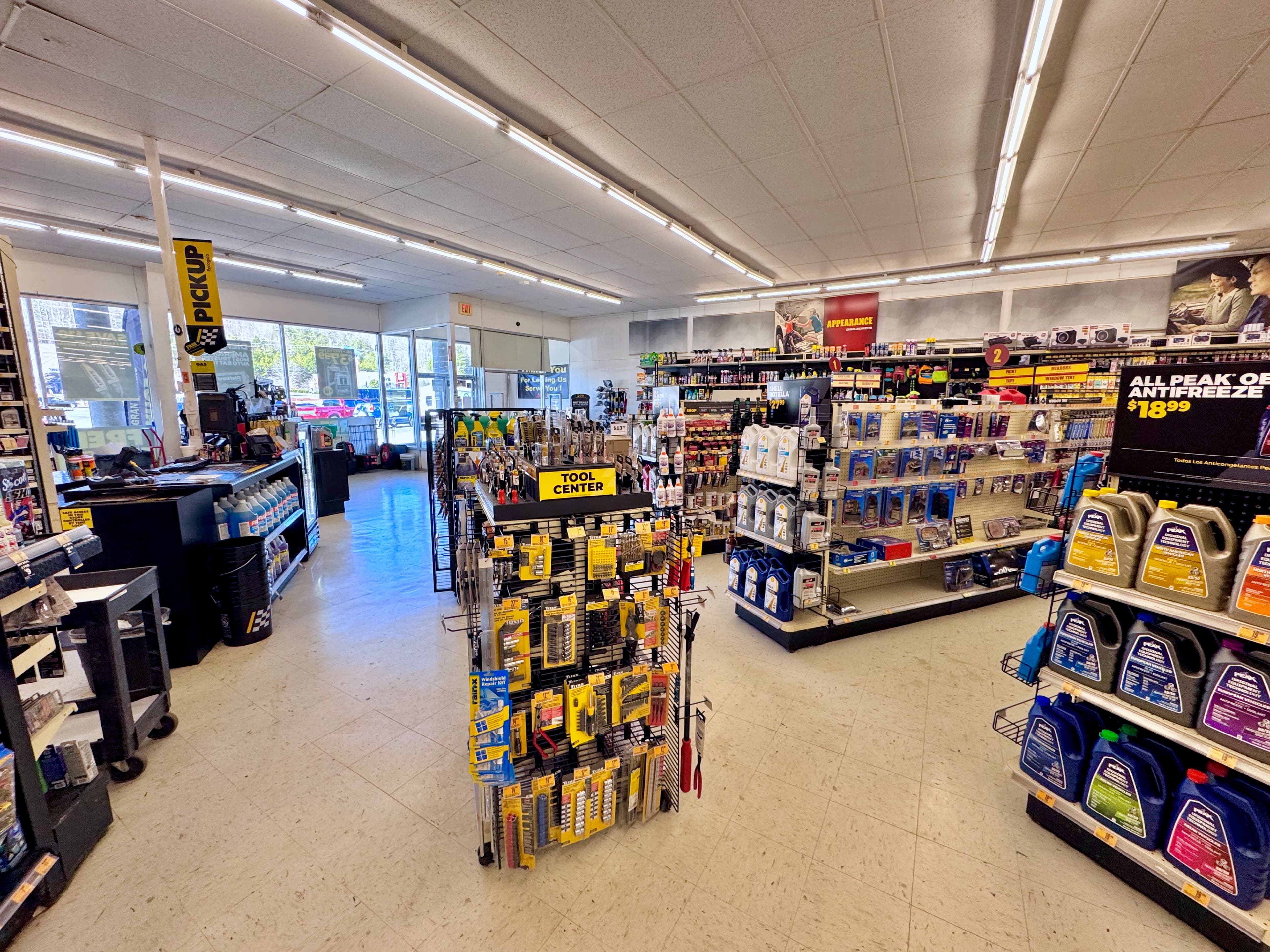 Aftermarket auto parts in retail packaging on store shelf