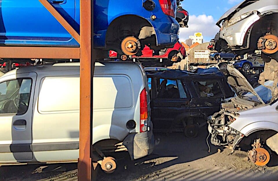 Automotive scrap and recycling facility processing end-of-life vehicles for circular material reclamation